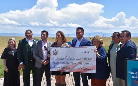 Vasquez presents check